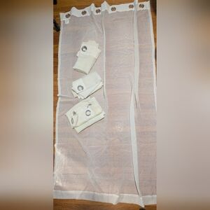 4 Panels Of Ivory Crushed Sheer Curtains. 6 Rings/Each. 86" x 50"
